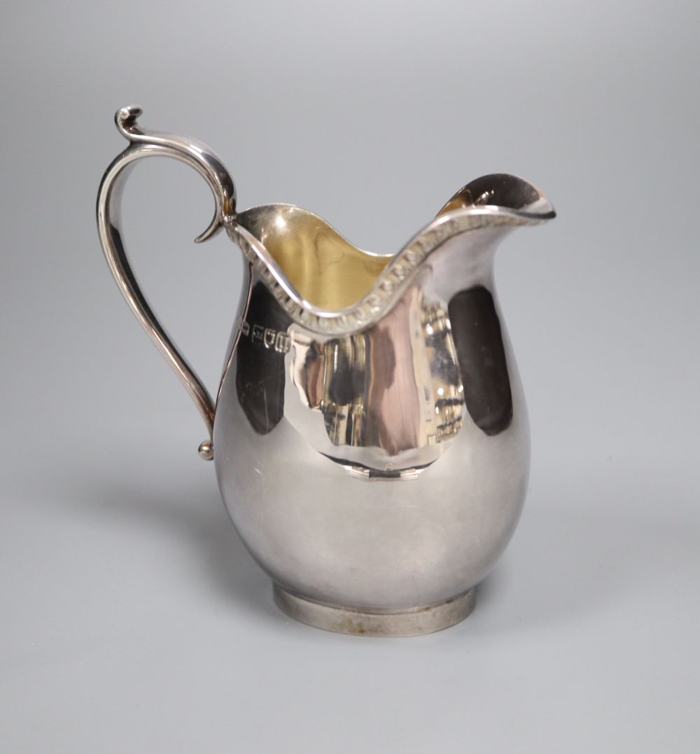 A George V Asprey & Co Ltd silver milk jug, London, 1915, 12.6cm, 5.5oz.